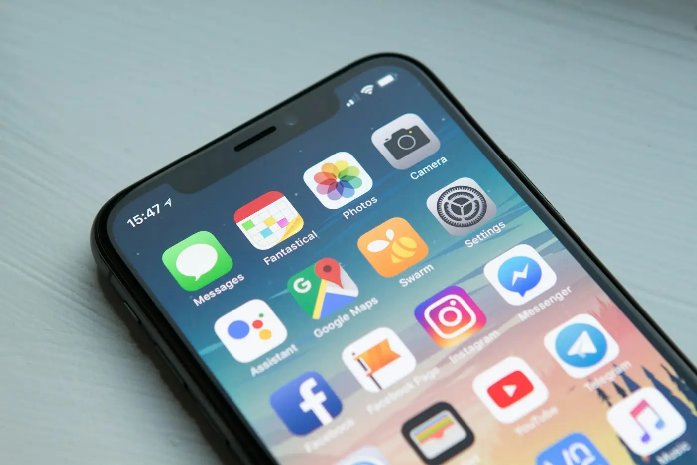 Smartphone home screen showing app icons